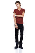 Uncomfortable and awkward looking guy isolated against a white b