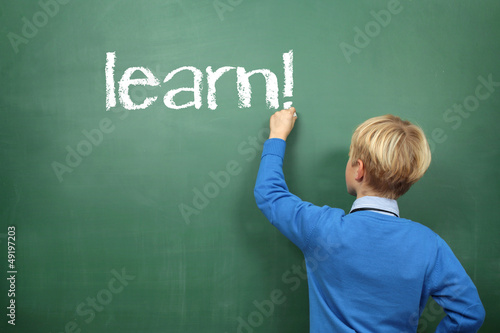 Photo: learn Schoolboy at the Blackboard learn Schoolboy at the Blackboard