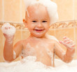 happy joyful kid in a bath