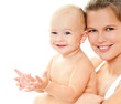 Young mother hugging baby