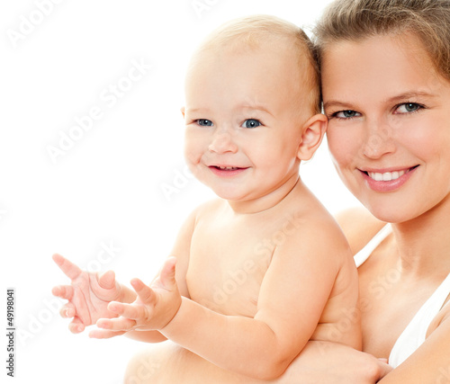 Photo: Young mother hugging baby Young mother hugging baby
