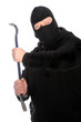 Masked man wielding a crowbar
