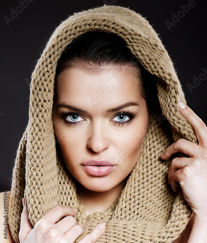 Photo: Portrait of beautiful woman with a hood Portrait of beautiful woman with a hood