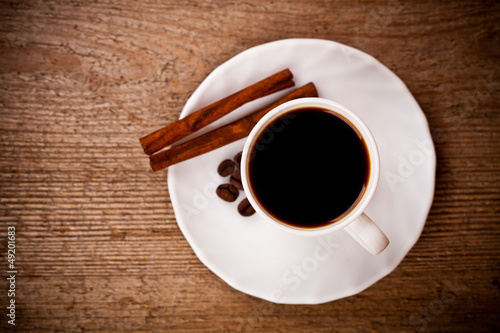 Photo: cup of coffee and cinnamon cup of coffee and cinnamon