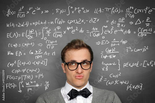 Photo: Man at the Blackboard with formulars Man at the Blackboard with formulars