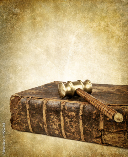 Photo: old law book and gavel old law book and gavel