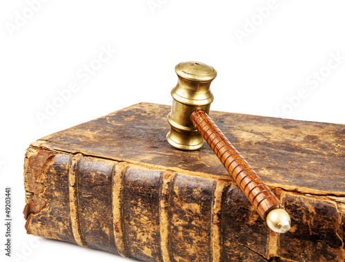 Photo: old law book and gavel old law book and gavel