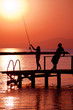 friends are fishing at sunset in turkey