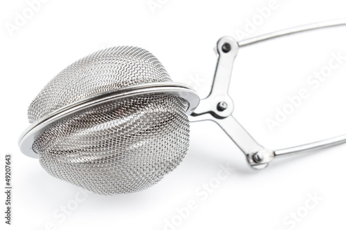 Photo: Tea strainer closeup, isolated on white with shadow Tea strainer closeup, isolated on white with shadow