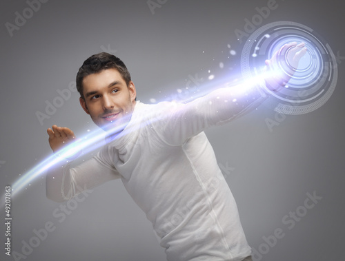 Photo: man working with virtual screen man working with virtual screen