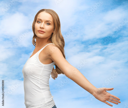 Photo: woman spreading hands woman spreading hands