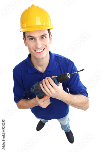 Photo: Man holding power drill Man holding power drill