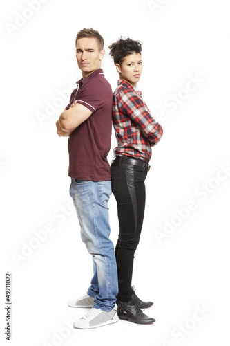 Photo: Upset young couple standing together Upset young couple standing together