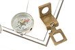 Antique compass and magnifying glass on map