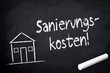 Kreidetafel mit Sanierungskosten