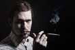 young man smoking cigarette
