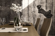Closeup of a dining table with glasses and flowers