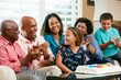 Multi Generation Family Celebrating Daughter's Birthday