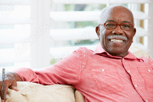 Photo: Portrait Of Happy Senior Man At Home Portrait Of Happy Senior Man At Home