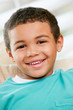 Head And Shoulders Portrait Of Young Boy