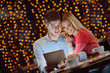 Photo: young couple with a tablet computer young couple with a tablet computer