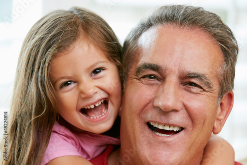 Photo: Portrait Of Grandfather With Granddaughter Portrait Of Grandfather With Granddaughter