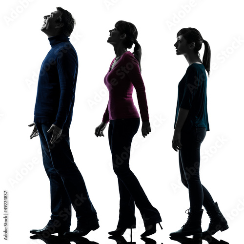 Photo: family father mother daughter looking up surprised silhouette family father mother daughter looking up surprised silhouette