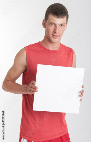 Photo: Athlete with sign Athlete with sign