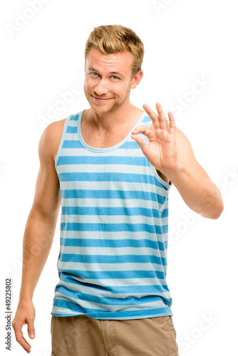 Photo: Happy man giving okay sign - portrait on white background Happy man giving okay sign - portrait on white background