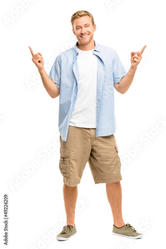 Photo: Happy man pointing - portrait on white background Happy man pointing - portrait on white background