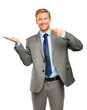 Happy young businessman showing empty copyspace on white backgro