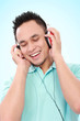 Photo: young man listening to music young man listening to music