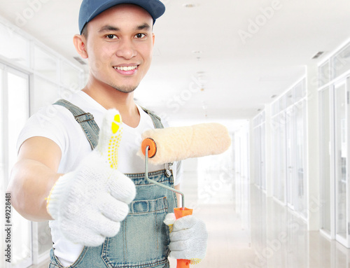 Photo: painter worker showing thumb up painter worker showing thumb up