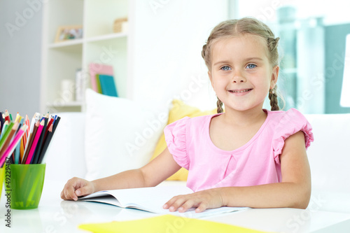 Photo: Girl with crayons Girl with crayons