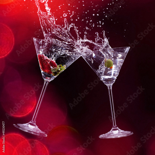 Photo: martini drinks over dark background martini drinks over dark background