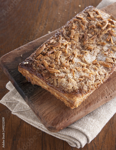 Photo: Puff pastry with almonds, sugar and greaves Puff pastry with almonds, sugar and greaves