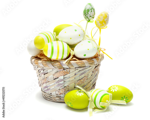 Photo: colorful easter eggs in basket colorful easter eggs in basket