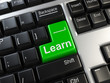 Illustration: Close up view on conceptual keyboard - Learn (green key) Close up view on conceptual keyboard - Learn (green key)