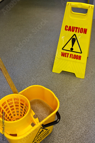 Photo: Mopping floor warning sign Mopping floor warning sign