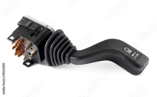 Photo: switch mounted on the steering column in a car on white switch mounted on the steering column in a car on white