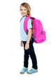Photo: Happy little girl carrying school bag Happy little girl carrying school bag