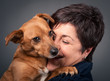 Small dog and middle age woman.