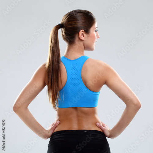 Photo: Young woman in fitness wear Young woman in fitness wear