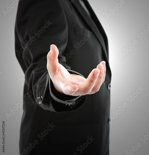 Photo: Business man with empty hand Business man with empty hand