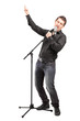 Full length portrait of a male singer performing a song