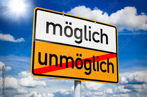 Photo: Wegweiser mit unmöglich und möglich Wegweiser mit unmöglich und möglich