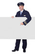 Portrait Of Happy Pilot Holding Blank Placard
