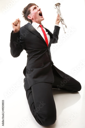 Photo: young man joy, glee and his Trumpet young man joy, glee and his Trumpet
