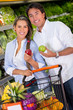 Couple grocery shopping