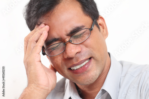Photo: Man With Headache Man With Headache